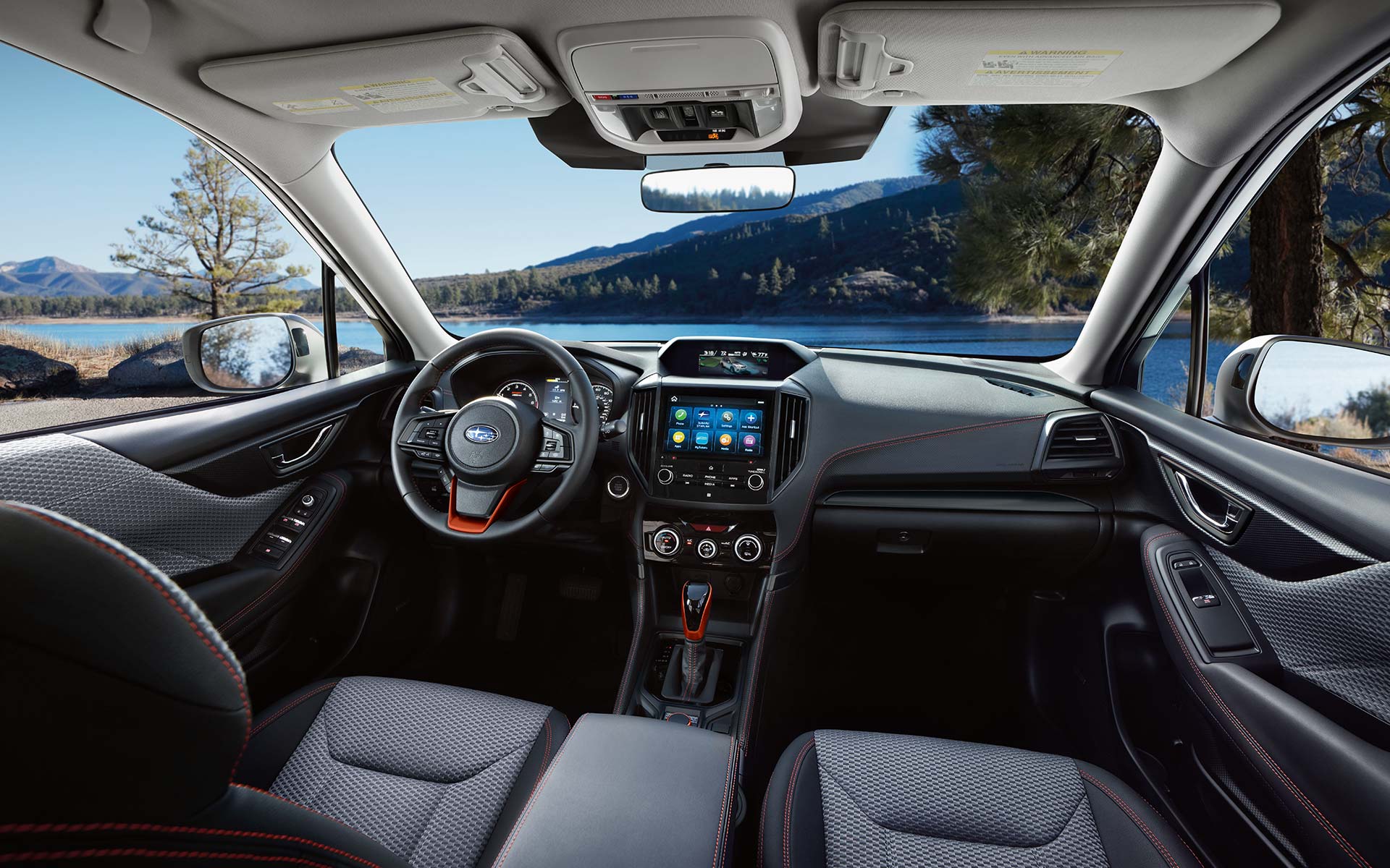 The rear cargo area of the 2022 Forester with the rear seats folded down